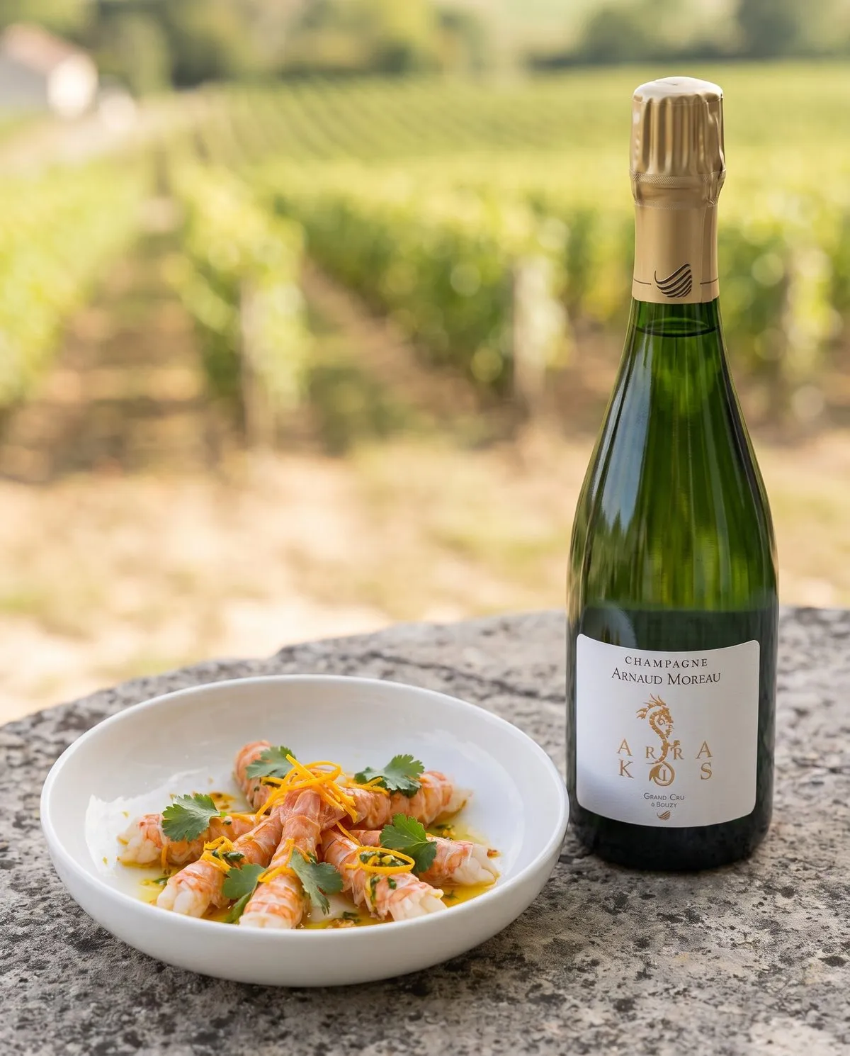 Langoustines marinées minute, huile vierge aux agrumes et coriandre · accord champagne Arnaud Moreau